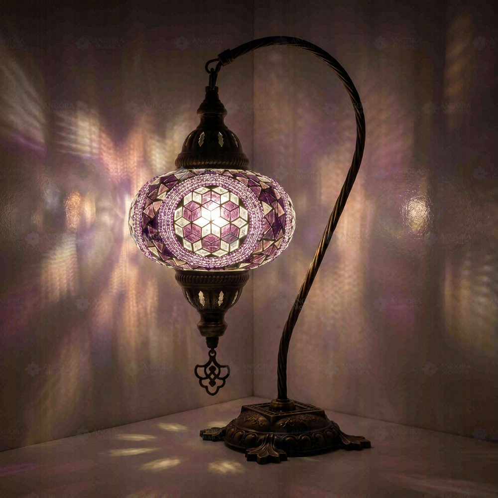 Purple Swan Neck Table Lamp, glowing in a dark room