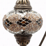 Close-up of Amber warm amber mosaic glass globe pattern — table lamp (ENV DVN3092)