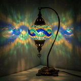 Blue Turkish mosaic table lamp illuminated, showing colorful light projection (ENV DVN3094)