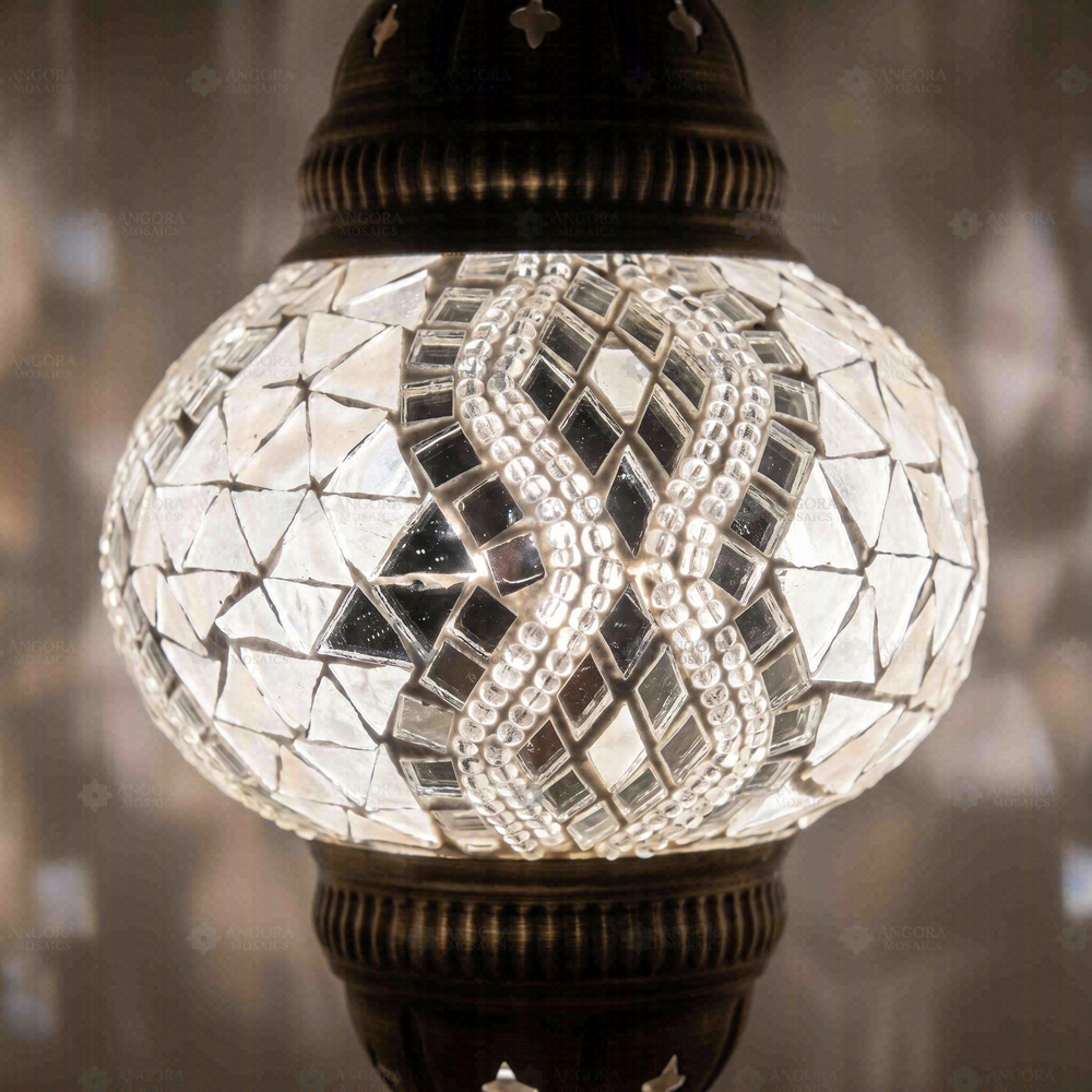 Clear Mirrored Pendant Lamp, close-up of the lit glass