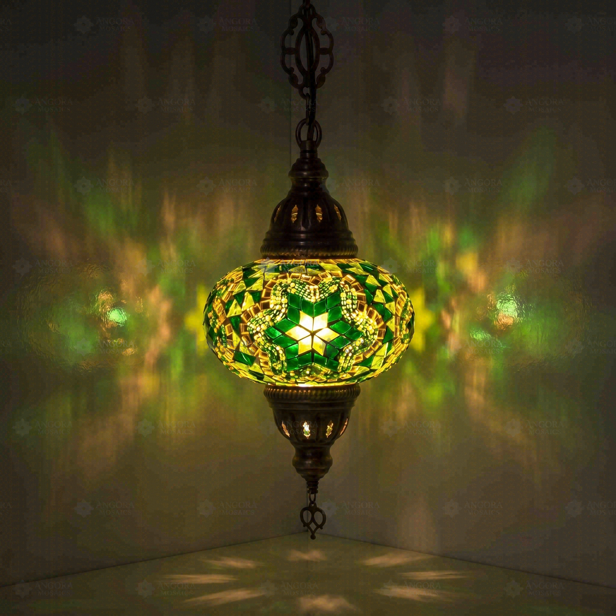 Emerald Green Pendant Lamp, switched on, glowing in a dark room