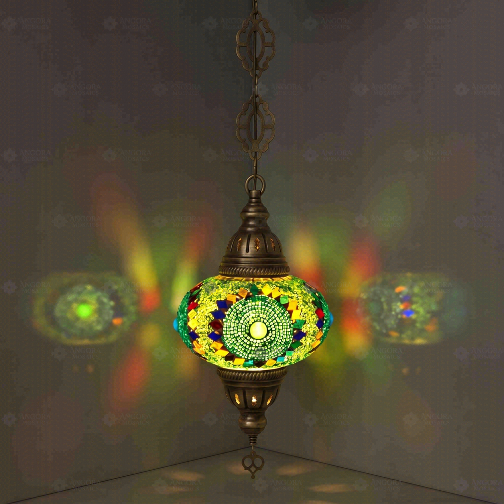 Green Pendant Lamp, glowing in a dark room