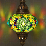 Lit close-up of mosaic glass globe — Green pendant light glowing (ENV DYN3006)