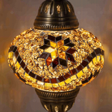 Lit close-up of mosaic glass globe — Amber pendant light glowing (ENV DYN3009)