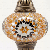 Close-up of Amber warm amber mosaic glass globe pattern — pendant light (ENV DYN3026)