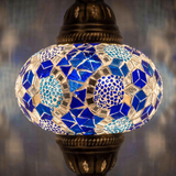 Lit close-up of mosaic glass globe — Blue pendant light glowing (ENV DYN3028)