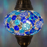 Lit close-up of mosaic glass globe — Blue pendant light glowing (ENV DYN3032)