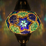 Lit close-up of mosaic glass globe — Blue pendant light glowing (ENV DYN3040)