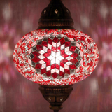 Lit close-up of mosaic glass globe — Red pendant light glowing (ENV DYN3044)