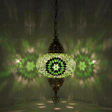 Green Turkish mosaic pendant light illuminated, showing colorful light projection (ENV DYN3048)