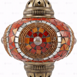 Close-up of Amber warm amber mosaic glass globe pattern — pendant light (ENV DYN3052)