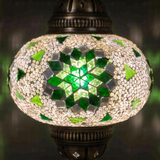 Lit close-up of mosaic glass globe — Green pendant light glowing (ENV DYN3055)