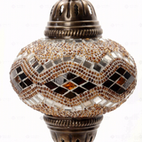 Close-up of Amber warm amber mosaic glass globe pattern — pendant light (ENV DYN3057)