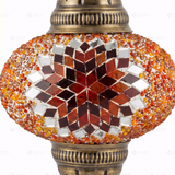 Close-up of Amber warm amber mosaic glass globe pattern — pendant light (ENV DYN3065)