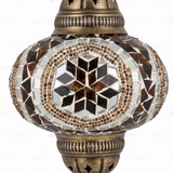 Close-up of Amber warm amber mosaic glass globe pattern — pendant light (ENV DYN3067)