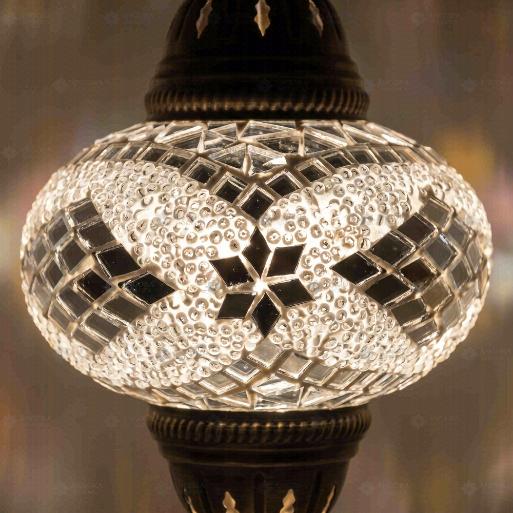 White Mirrored Pendant Lamp, close-up of the lit glass