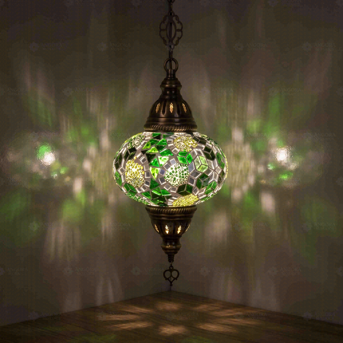 Green Pendant Lamp, switched on, glowing in a dark room