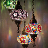 Lit close-up of mosaic glass globe — Multicolor chandelier glowing (ENV HLZ4N3 (03-17-19-21))