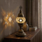 Amber warm amber Turkish mosaic table lamp in styled room — handmade Moroccan table lamp (ENV MUN1022)