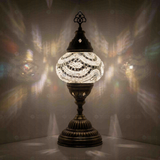 White Turkish mosaic table lamp illuminated, showing colorful light projection (ENV MUN2001)