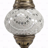 Close-up of White white glow mosaic glass globe pattern — table lamp (ENV MUN2001)