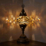 Amber Turkish mosaic table lamp illuminated, showing colorful light projection (ENV MUN2079)