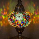 Lit close-up of mosaic glass globe — Multicolor table lamp glowing (ENV MUN3001)