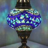 Lit close-up of mosaic glass globe — Blue table lamp glowing (ENV MUN3005)