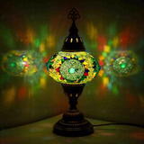 Green Turkish mosaic table lamp illuminated, showing colorful light projection (ENV MUN3006)