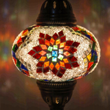 Lit close-up of mosaic glass globe — Multicolor table lamp glowing (ENV MUN3007)