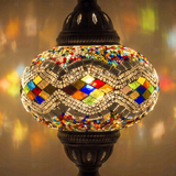 Lit close-up of mosaic glass globe — Multicolor table lamp glowing (ENV MUN3014)