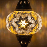 Lit close-up of mosaic glass globe — White table lamp glowing (ENV MUN3015)