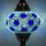 Lit close-up of mosaic glass globe — Blue table lamp glowing (ENV MUN3027)