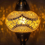 Lit close-up of mosaic glass globe — Clear table lamp glowing (ENV MUN3036)