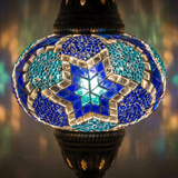 Lit close-up of mosaic glass globe — Blue table lamp glowing (ENV MUN3040)