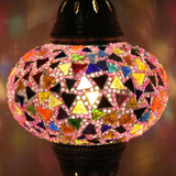 Lit close-up of mosaic glass globe — Pink table lamp glowing (ENV MUN3046)