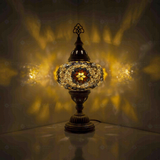 Amber Turkish mosaic table lamp illuminated, showing colorful light projection (ENV MUN3049)