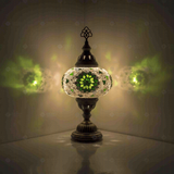 Green Turkish mosaic table lamp illuminated, showing colorful light projection (ENV MUN3055)