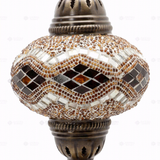 Close-up of Amber warm amber mosaic glass globe pattern — table lamp (ENV MUN3057)