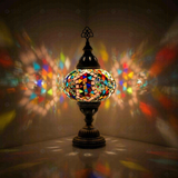 Multicolor Turkish mosaic table lamp illuminated, showing colorful light projection (ENV MUN3060)