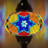 Lit close-up of mosaic glass globe — Multicolor table lamp glowing (ENV MUN3061)