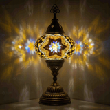 Warm Tones Turkish mosaic table lamp illuminated, showing colorful light projection (ENV MUN3063)