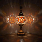 Amber Turkish mosaic table lamp illuminated, showing colorful light projection (ENV MUN3065)