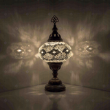 White Turkish mosaic table lamp illuminated, showing colorful light projection (ENV MUN3068)