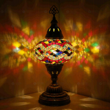 Multicolor Turkish mosaic table lamp illuminated, showing colorful light projection (ENV MUN3074)