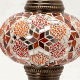 Close-up of Amber warm amber mosaic glass globe pattern — table lamp (ENV MUN3079)