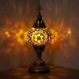 Amber Turkish mosaic table lamp illuminated, showing colorful light projection (ENV MUN3089)