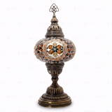 Close-up of Amber warm amber mosaic glass globe pattern — table lamp (ENV MUN3089)