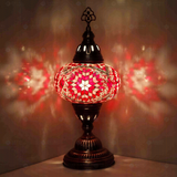 Red Turkish mosaic table lamp illuminated, showing colorful light projection (ENV MUN3090)