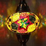 Lit close-up of mosaic glass globe — Multicolor table lamp glowing (ENV MUN3093)